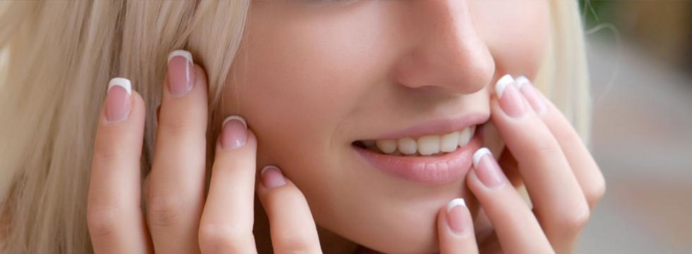 a girl with beautiful smile and beautiful nails