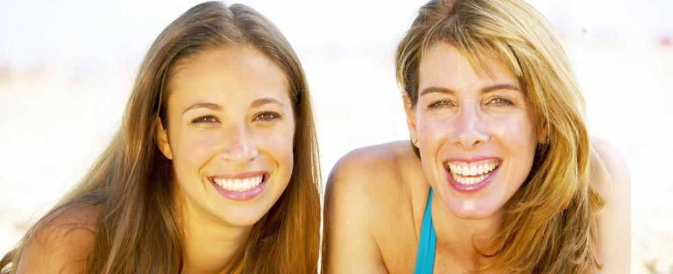 two ladies smiling 